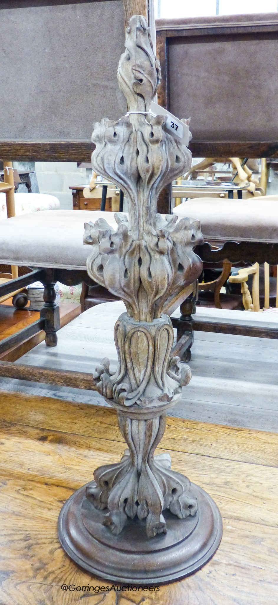 A 19th century decorative carved limed oak finial, height 80cm